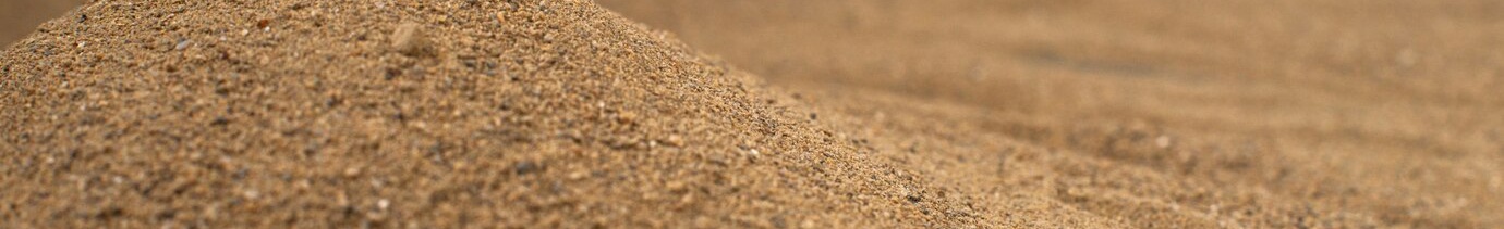 c7458fa6-97e2-4b39-b0d2-c46bc8371dff-brown-sand-surface-black-wall_179666-37340.jpg